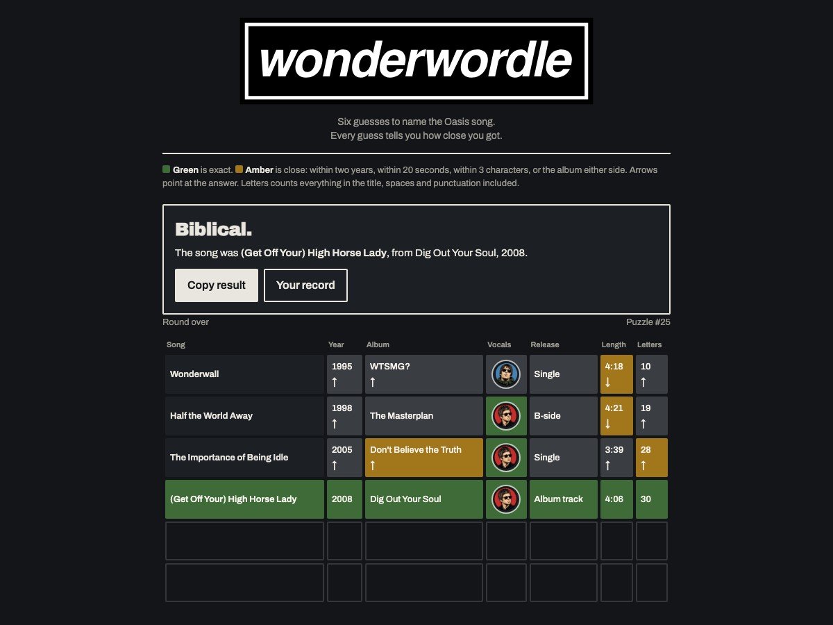 The live game in dark mode, with the colour key above the board and a solved puzzle